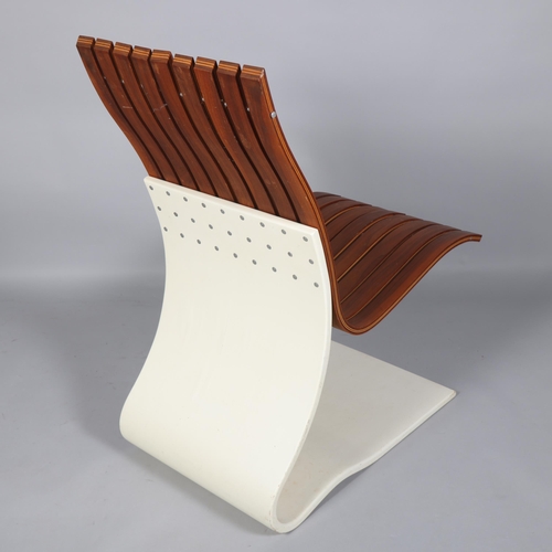 137 - EDWARD JOHNSON, a cantilever Easy Chair in slatted laminated walnut and white lacquered bent ply, he... 