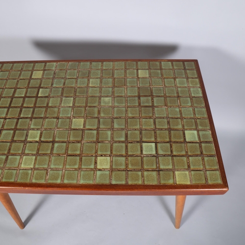 140 - A 1950's Italian style teak tile-top kitchen or dining table, on beech frame, height 76cm, top 100 x... 