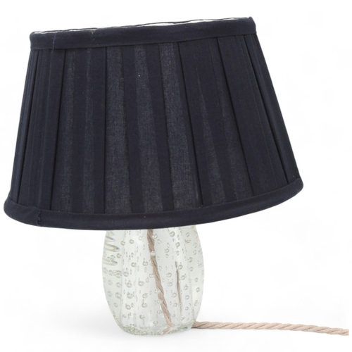 194 - A Murano glass lamp, with clear bubble glass base and black fabric shade, overall height 27cm