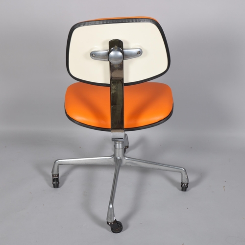 206 - CHARLES EAMES, a rare Herman Miller EC228 secretarial chair, 1971, with orange leather upholstery, w... 