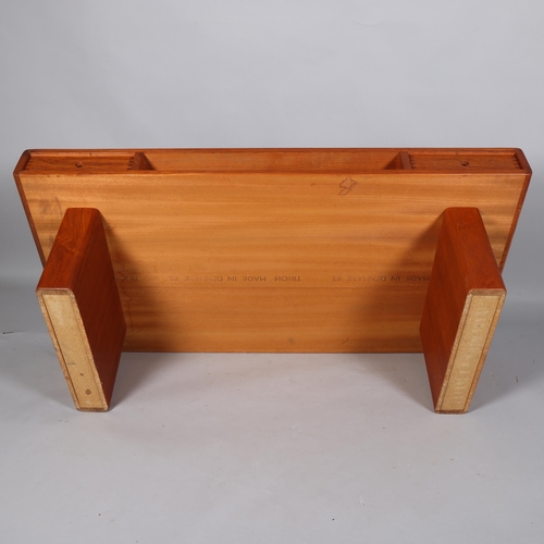 207 - A mid 20th century teak coffee table by Trioh, Denmark, with two double sided sliding drawers and st... 