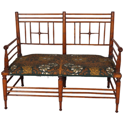 208 - Liberty and Co, an Arts and Crafts Argyll 2 seater bench settee, ca 1890, later upholstered with Lib... 