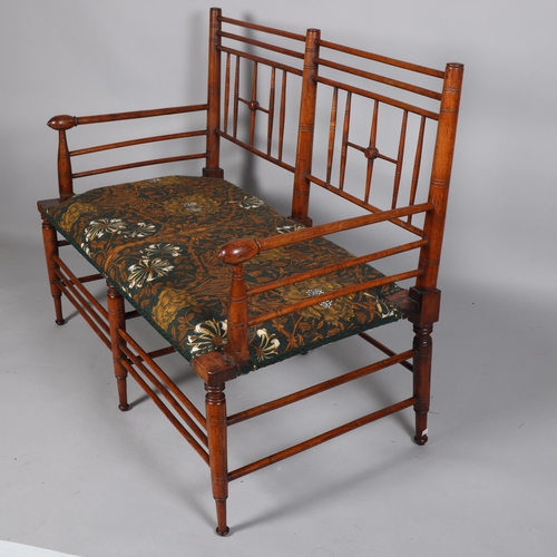 208 - Liberty and Co, an Arts and Crafts Argyll 2 seater bench settee, ca 1890, later upholstered with Lib... 