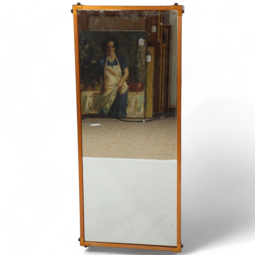 209 - A 1920s/30s Modernist wall mirror, with copper plated surround, 81 x 34cm