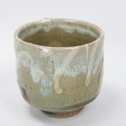 214 - TAKESHI YASUDA (born 1943); a stoneware yunomi , with ash and chun glaze and raised slip decoration,... 