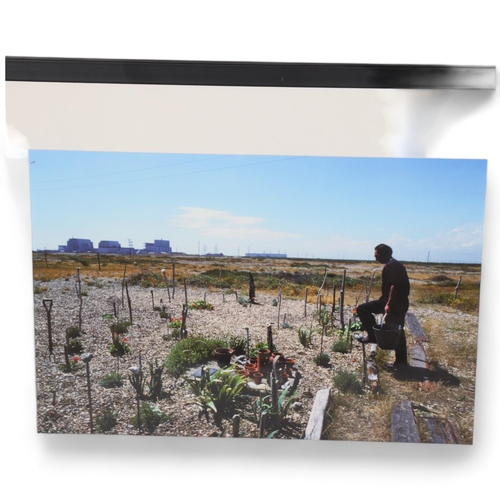 235 - J R COLE, a photographic print of Derek Jarman in his garden, entitled 