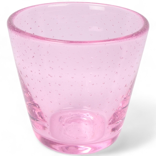 239 - MARJA HEPO-AHO, Finland, a small vase in pink glass with controlled bubbles produced with a hedgehog... 