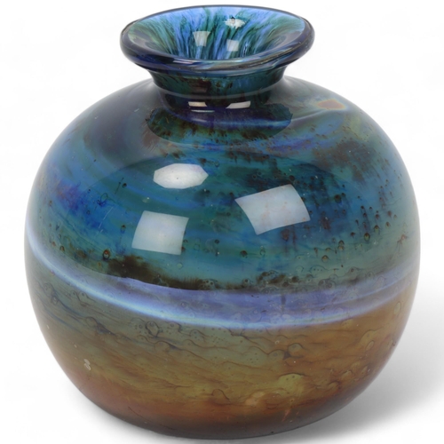 251 - A small blue/green Isle of Wight glass vase, with flame pontil and lable to base, height 10cm