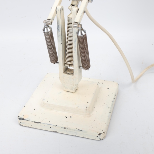 267 - A Herbert Terry Anglepoise lamp, cream paintwork, with two-step base, makers stamp, approx height 85... 