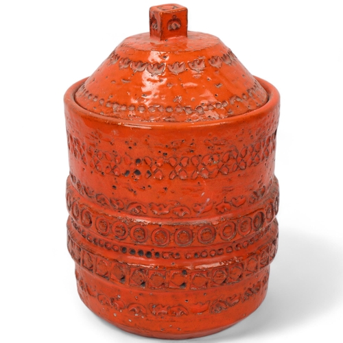 273 - An Italian Bitossi style storage jar and cover, with orange glaze, makers mark to base, height 23cm