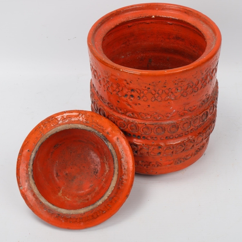 273 - An Italian Bitossi style storage jar and cover, with orange glaze, makers mark to base, height 23cm