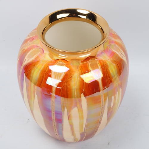 278 - CAROLINE & STEPHEN ATKINSON-JONES, a slip-cast  ceramic vase, with gold lustre glaze, with original ... 