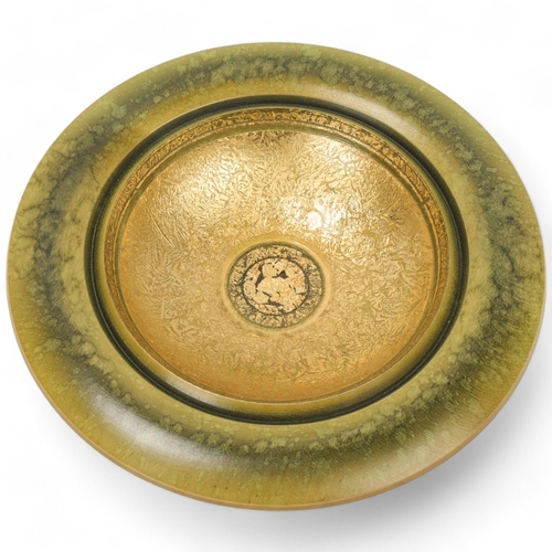 285 - DENNIS HALES, a hand turned hardwood wall- hanging bowl, green coloured surface finish and gilding t... 