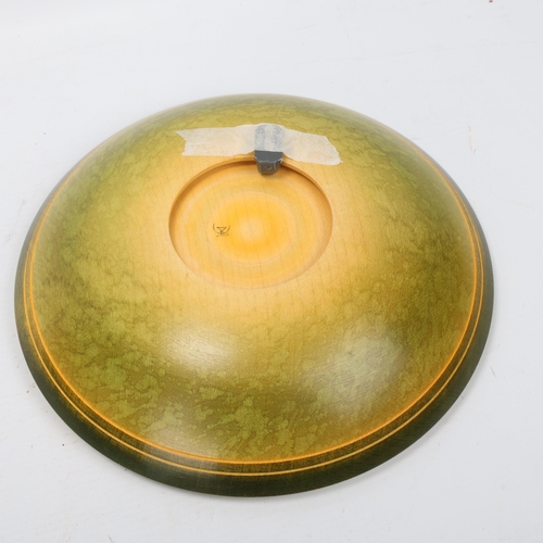 285 - DENNIS HALES, a hand turned hardwood wall- hanging bowl, green coloured surface finish and gilding t... 