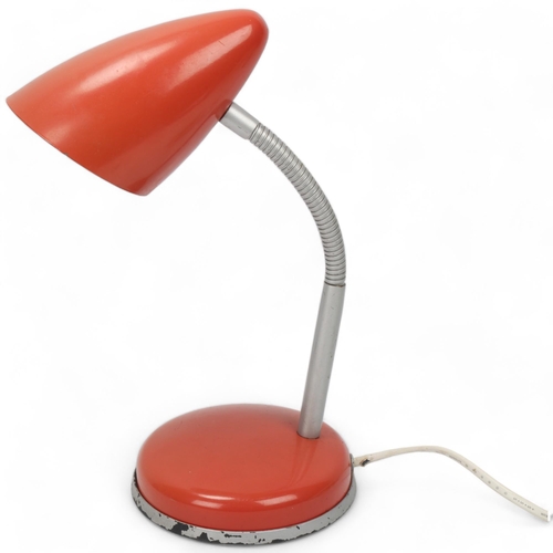 296 - A mid 20th century table light, red steel shade and base with adjustable swan neck, manufacturers la... 