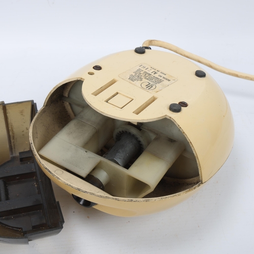 298 - A 1960s' Boston egg electric pencil sharpener with cream and brown plastic body, model #16, makers l... 