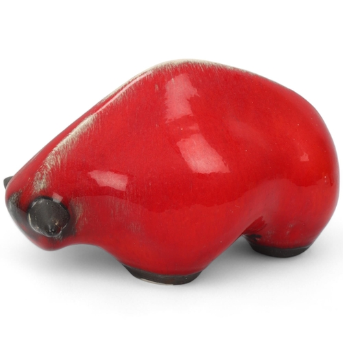 309 - DAVID SHARPE for Rye Pottery, a 1960s' red glazed bull, signed to base, length 24cm