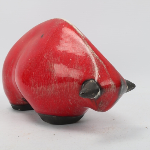 309 - DAVID SHARPE for Rye Pottery, a 1960s' red glazed bull, signed to base, length 24cm