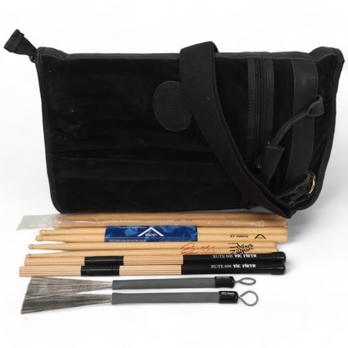 67 - A Black Suede LEVY'S (Canada) STICKBAG contains: Two VIC FIRTH 'RUTE 606', Two PRO-MARK 'TB-5' Brush... 