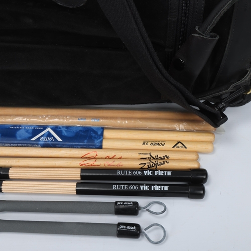 67 - A Black Suede LEVY'S (Canada) STICKBAG contains: Two VIC FIRTH 'RUTE 606', Two PRO-MARK 'TB-5' Brush... 