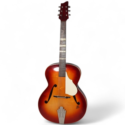 68 - A 1957 Framus Archtop acoustic guitar, with sunburst finish, and original hard case