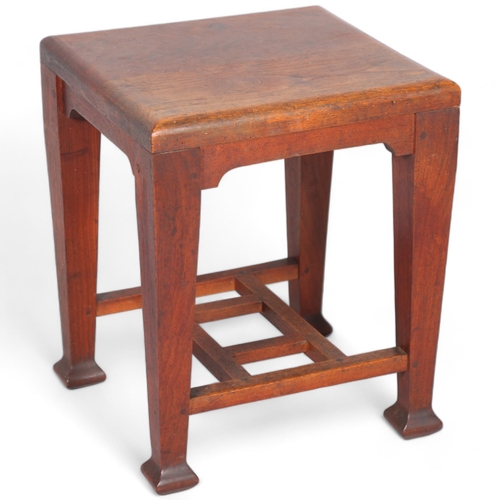 87 - A mahogany Arts and Crafts side table, height 45cm, top 35 x 38cm