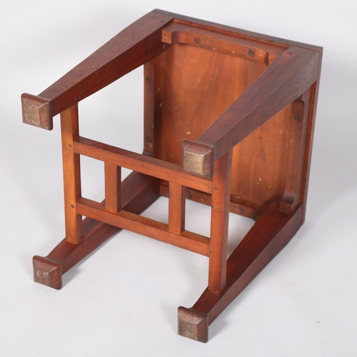 87 - A mahogany Arts and Crafts side table, height 45cm, top 35 x 38cm