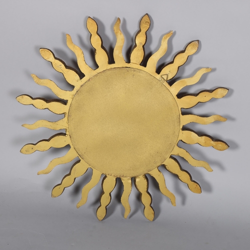 89 - A mid 20th century convex sunburst mirror, signed to rim STALUC, diameter 57cm