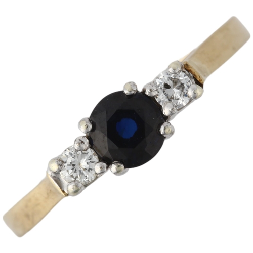 1379 - A 9ct gold three stone sapphire and diamond ring, setting height 4.7mm, size M, 2.1g