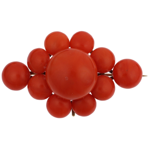 1109 - A Victorian button coral cluster brooch, circa 1880, with wirework frame and vacant drop, apparently... 