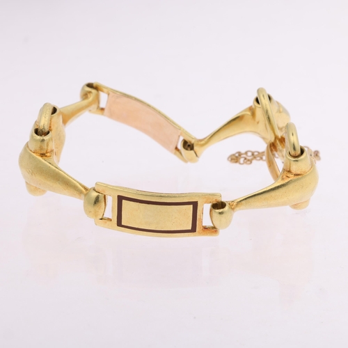 1120 - A Continental unmarked high carat gold and enamel snaffle link chain bracelet, band width 19.6mm, in... 