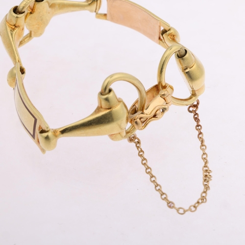 1120 - A Continental unmarked high carat gold and enamel snaffle link chain bracelet, band width 19.6mm, in... 