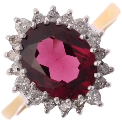 1123 - A late 20th century 18ct gold almandine garnet and diamond oval cluster ring, maker R Ltd, London 19... 