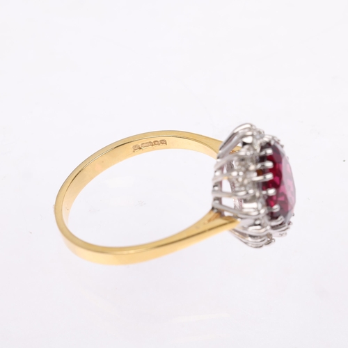 1123 - A late 20th century 18ct gold almandine garnet and diamond oval cluster ring, maker R Ltd, London 19... 