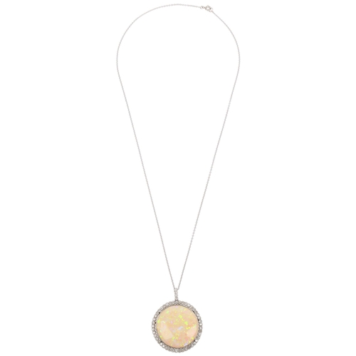 1125 - A Belle Epoque opal and diamond cluster pendant necklace, rub-over set with 15ct round cabochon opal... 