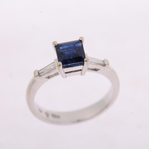 1126 - A modern 18ct white gold three stone sapphire and diamond ring, claw set with 1ct square step-cut sa... 