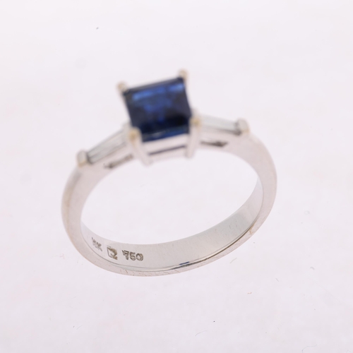 1126 - A modern 18ct white gold three stone sapphire and diamond ring, claw set with 1ct square step-cut sa... 