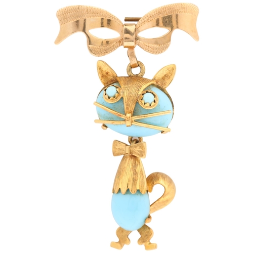 1131 - A mid-20th century Italian 18ct gold blue glass figural cat brooch, by Carl Art, circa 1960s, with l... 