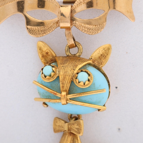 1131 - A mid-20th century Italian 18ct gold blue glass figural cat brooch, by Carl Art, circa 1960s, with l... 