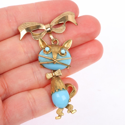 1131 - A mid-20th century Italian 18ct gold blue glass figural cat brooch, by Carl Art, circa 1960s, with l... 