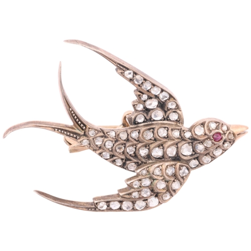 1132 - A 19th century ruby and diamond figural swallow bird brooch, circa 1890, set with rose-cut diamonds,... 