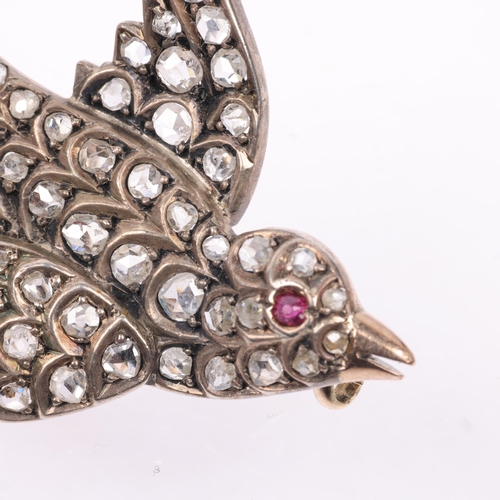 1132 - A 19th century ruby and diamond figural swallow bird brooch, circa 1890, set with rose-cut diamonds,... 