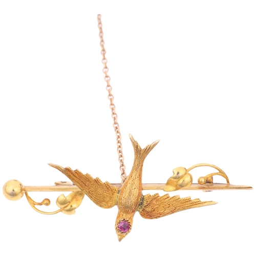 1133 - A Victorian 15ct gold ruby swallow bird bar brooch, 47mm, 4g