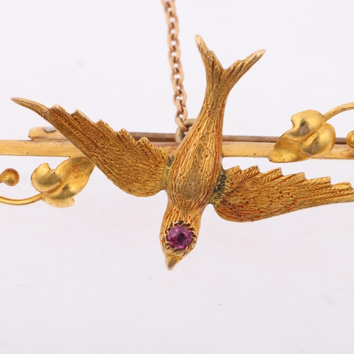 1133 - A Victorian 15ct gold ruby swallow bird bar brooch, 47mm, 4g