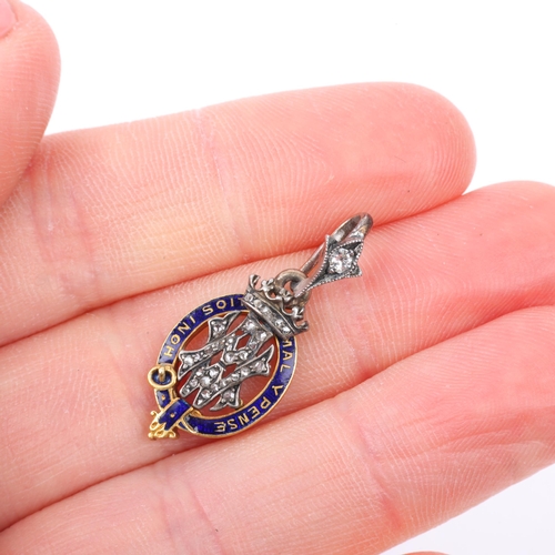 1135 - An early 20th century miniature diamond and blue enamel Order of the Garter pendant, presented by Pr... 