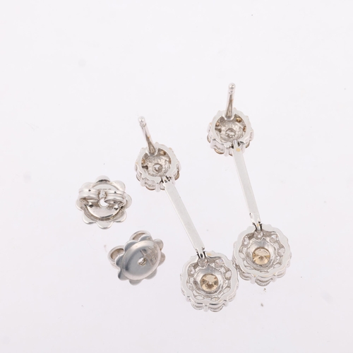 1142 - A pair of 18ct white gold champagne diamond and diamond flowerhead cluster drop earrings, set with m... 