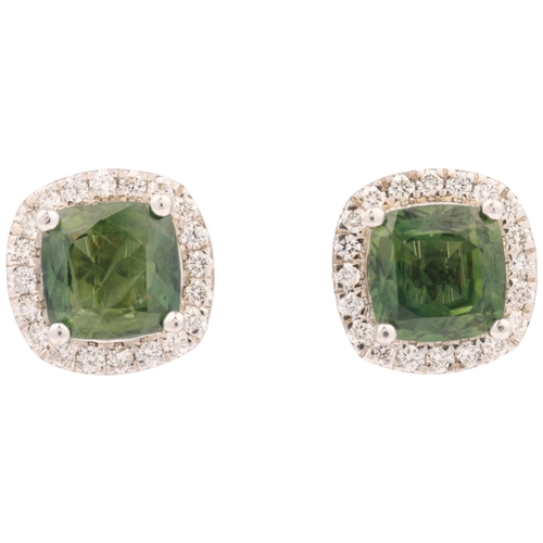 1145 - A pair of 9ct white gold demantoid garnet and diamond square cluster earrings, set with modern round... 