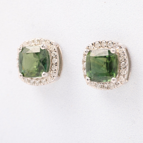 1145 - A pair of 9ct white gold demantoid garnet and diamond square cluster earrings, set with modern round... 