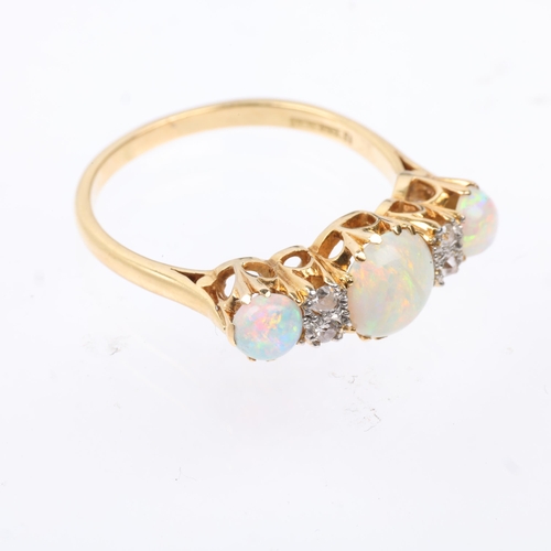 1149 - An early 20th century 18ct gold seven stone opal and diamond half hoop ring, set with round cabochon... 