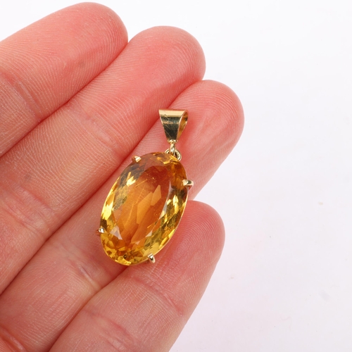 1151 - A late 20th century citrine drop pendant, claw set with 3.7ct oval mixed-cut citrine, apparently unm... 